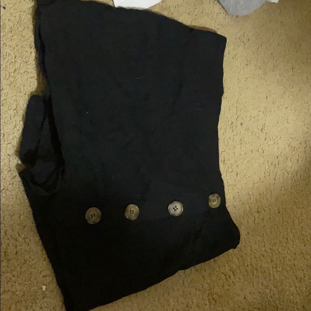 Shorts with buttons on the side